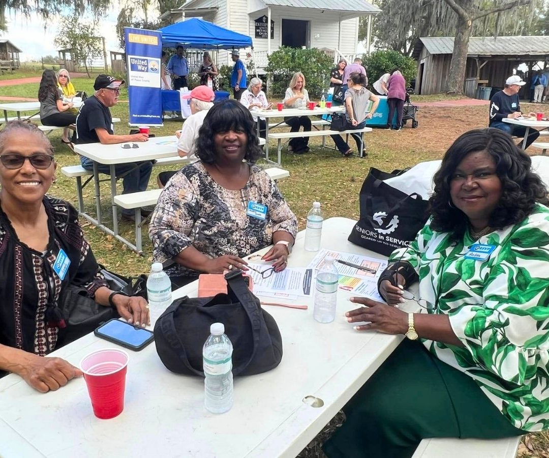 Volunteers Gather for Geared Up Appreciation Event Volunteers and community partners gather outdoors during a Geared Up Gathering volunteer appreciation event in Pasco County.